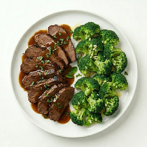 Slow-Roasted Beef with Mint Jus and Butter Garlic Broccoli